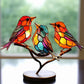 Dekoratives Ornament – Vögel, die auf einem Ast sitzen 