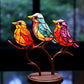 Dekoratives Ornament – Vögel, die auf einem Ast sitzen 