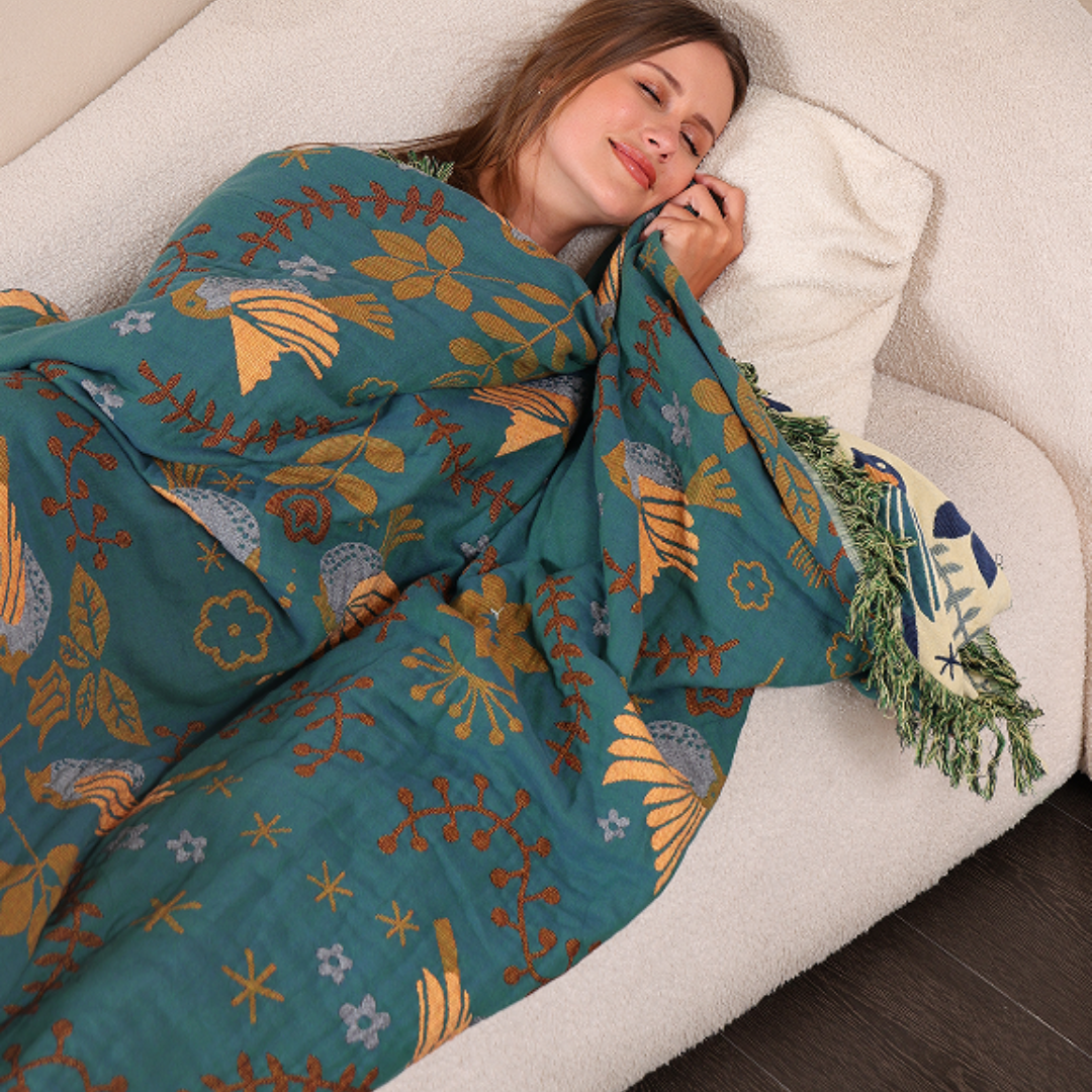 Vendbar plaid i skandinavisk stil med fuglemotiver 